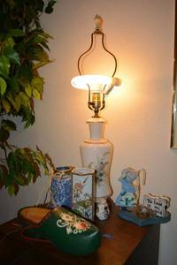 lot 263 image: Vintage painted glass table lamp, wooden clog and home dcor