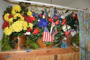 lot 296 image: Artificial flower arrangements - generous amount