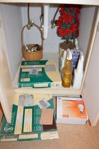 lot 486 image: Vinyl tiles, cleaners, Poinsettia tree and more