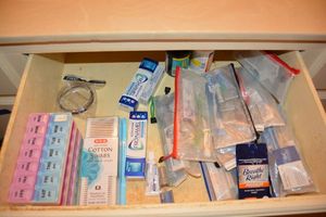lot 487 image: Toothbrushes, toothpaste, pill organizers