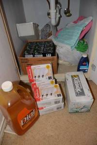 lot 490 image: Lightbulbs, hand soap refill, and band-aides