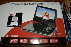 lot 427 image: 7 Portable DVD player