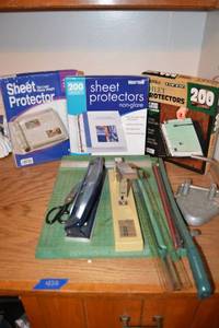 lot 420 image: Office supplies - sheet protectors, paper cutter, stapler and hole punchers