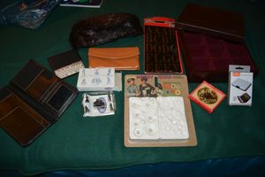 lot 477 image: Misc. lot - wooden box, furry hat, wallets, craft mold