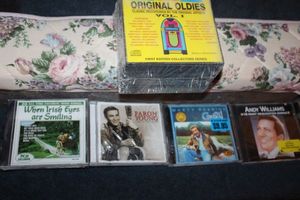 lot 466 image: CDs (Jim Owen has signature), many are unopened
