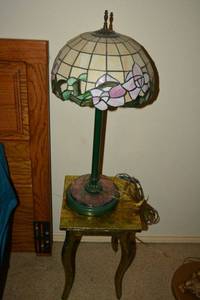 lot 441 image: Side table with gold foil and stained glass lamp