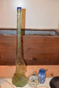 lot 528 image: Tall green elephant bottle, Brandy bottle and painted jar
