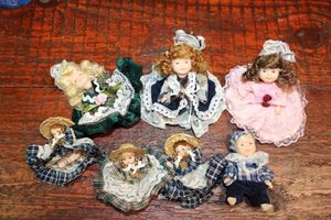 lot 588 image: Miniature porcelain dolls