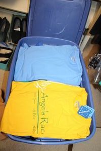 lot 555 image: Clothes most still have tags - T-shirts, sweats and socks