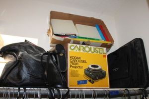 lot 564 image: Kodak carousel projector, slides and binoculars