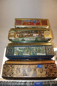 lot 569 image: Cookie tins as shown