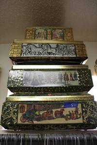 lot 571 image: Cookie tins as shown
