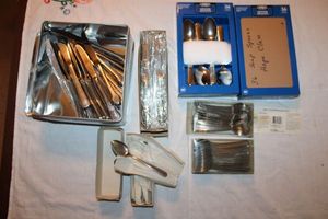 lot 599 image: Flatware - spoons and knives as shown