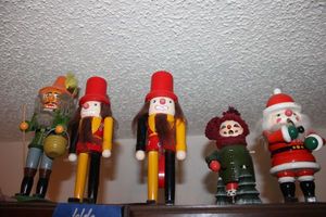 lot 666 image: Nutcrackers and wooden dolls