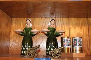 lot 418 image: Home dcor Brass canons, glazed folk women, and cups