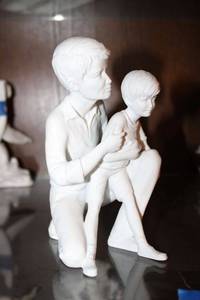 lot 763 image: Kaiser Father and Son figurine - 7 tall