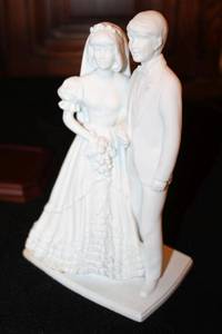 lot 766 image: Kaiser Bride and Groom Porcelain figurine with wood base - 10 tall