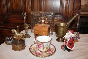 lot 781 image: Home dcor Brass pestle and mortar, brass carousel music box, brass scissors stand, roll top desk music box and more