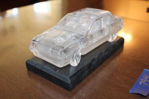 lot 794 image: Lead Crystal Car figurine with wood base - about 8 long