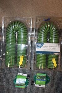 lot 803 image: Soaker hoses and coil garden hoses