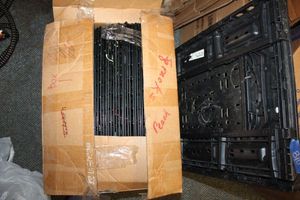 lot 810 image: Black wire shelving and garden hose