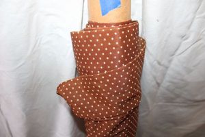 lot 870 image: Fabric Bolt - Brown with white polka dots