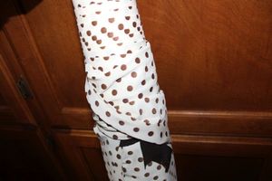 lot 846 image: Fabric bolt - white with brown polka dots