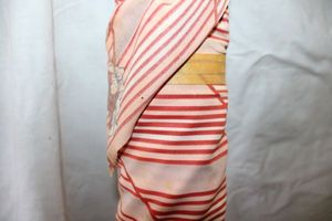 lot 857 image: Fabric Bolt - Peach with orange stripes