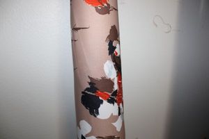 lot 855 image: Fabric Bolt - Tan with flowers
