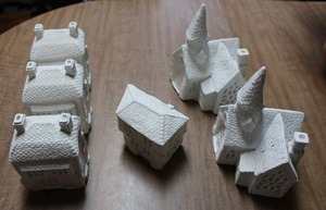 lot 888 image: Unpainted village houses