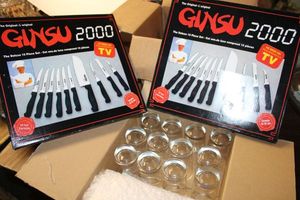 lot 923 image: Ginsu 2000 Knife sets and juice glass set