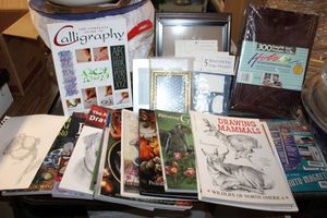 lot 926 image: Art and drawing books with photo frames