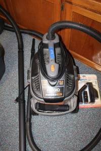 lot 973 image: Ridgid Portable Vac with attachments