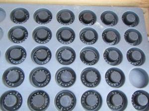 lot 47 image: black dial knobs