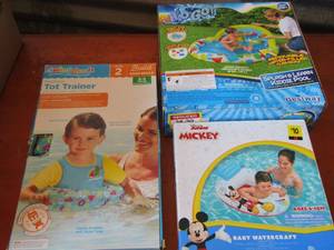 lot 20 image: mickey baby float, tot trainer, baby splash and learn kiddie pool tool
