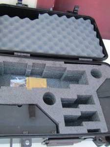 lot 135 image: Black vacuum seal cases with padding inside