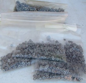 lot 167 image: SMALL NUTS & BLACK RUBBER GROMMETS