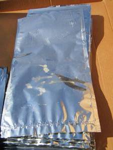 lot 233 image: silver parts bags