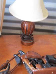 lot 275 image: table lamp with shade, wooden motorcycle
