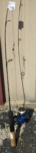 lot 290 image: SHAKESPHERE REEL WITH FISHING ROD