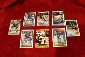 lot 211 image: Curtis Kujo Joseph, Cam Neely, and Pat Coffey Hockey Trading Cards