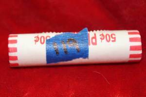 lot 119 image: Unsearched Bank Roll of Cents