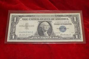 lot 187 image: ERROR 1957 $1 Silver Certificate Miscut Off Center Print