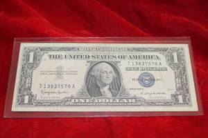 lot 296 image: 1957 $1 Silver Certificate Gas Pump ERROR