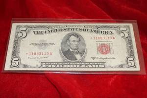 lot 112 image: Rare 1953 B Red Seal $5 Star Note Trinary