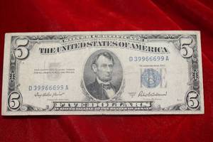 lot 148 image: Rare 1953 A $5 SIlver Certificate Trinary