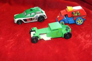 lot 135 image: Tom and Jerry, Super Mario, and Minecraft Hotwheels Toy Cars