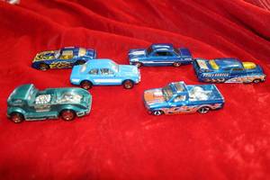 lot 91 image: Blue and Blue-Green Hot Wheels Cars