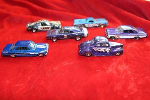 lot 78 image: Blue and Purple Hot Wheels Cars