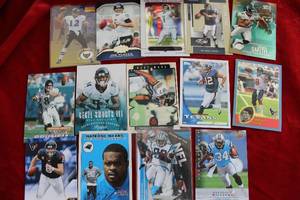 lot 142 image: Ravens, Jaguars, Texans, and Panthers Football Trading Cards